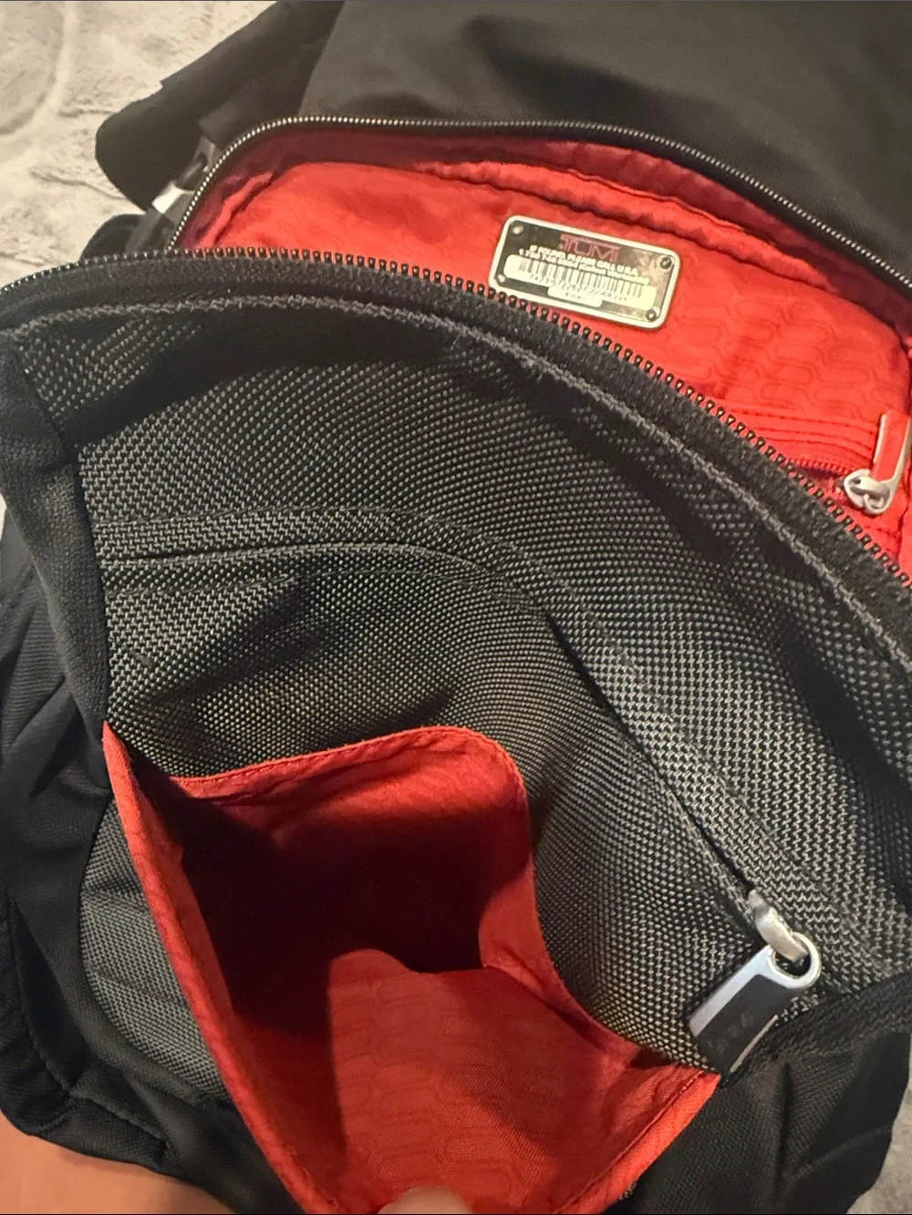Tumi Black Nylon Men's Backpack with Red Logo Accent